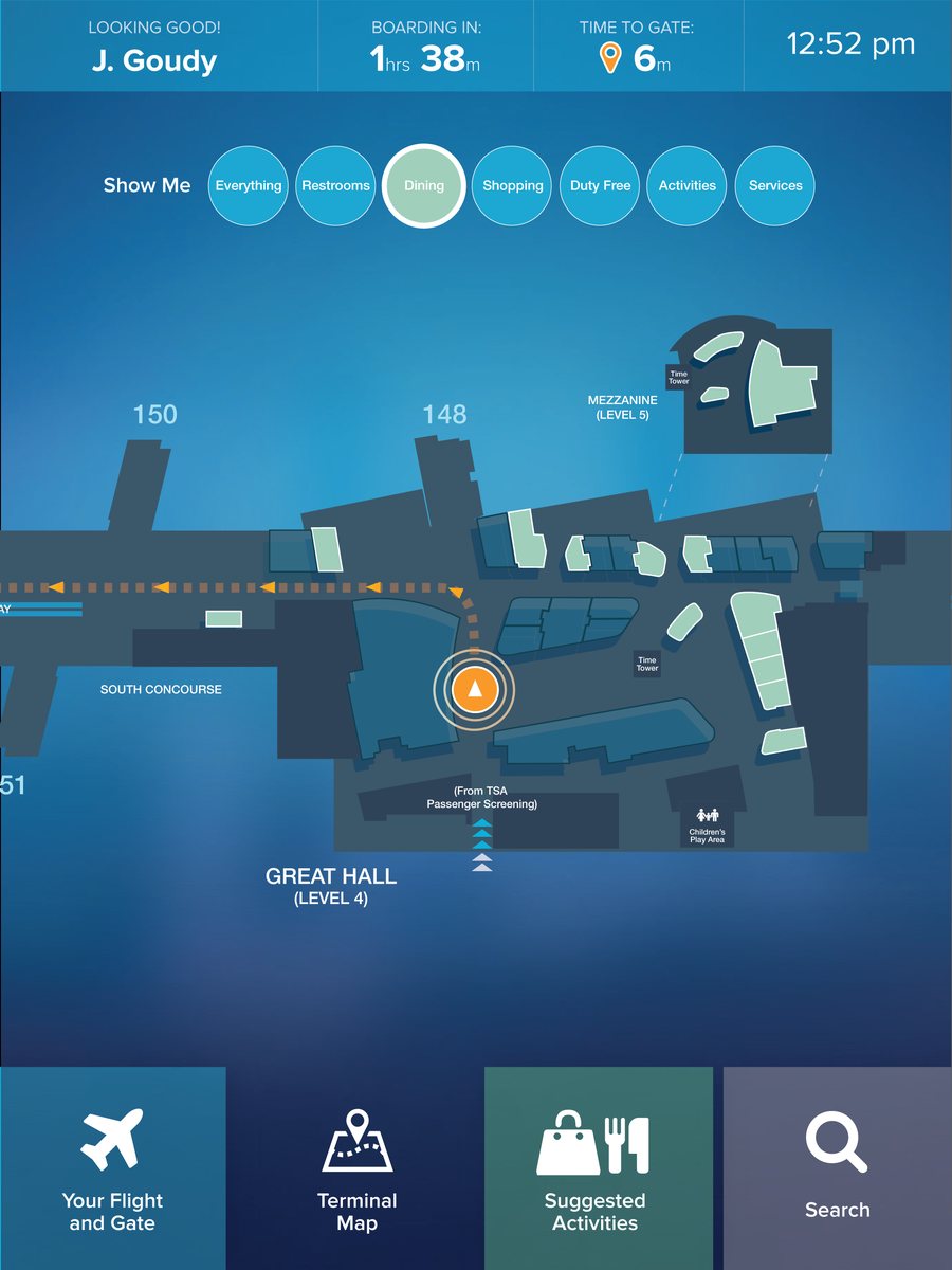 A kiosk screen: the traveler’s name, boarding in one hour 38 minutes, six minutes to the gate, and a terminal map filtered to dining.